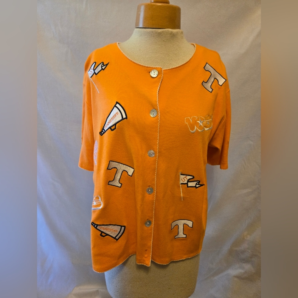 Orange and White Blouse with Decorative Appliqués